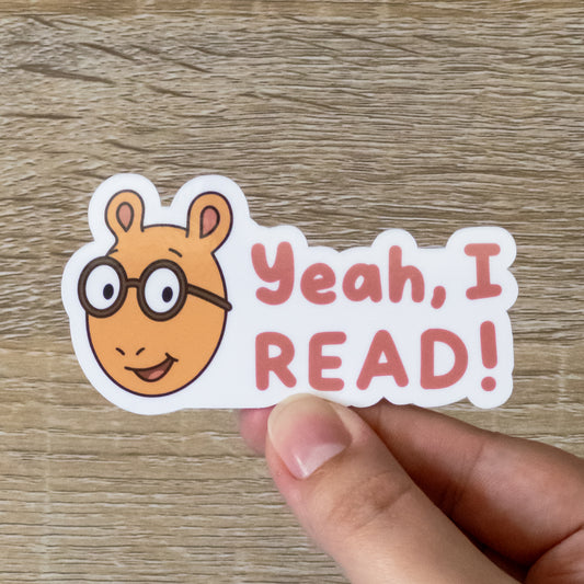 Glossy 3.3 inch wide sticker. Design is Arthur Read with the text, "Yeah, I READ!" Inspired by Athur the Aardvark from PBS Kids.