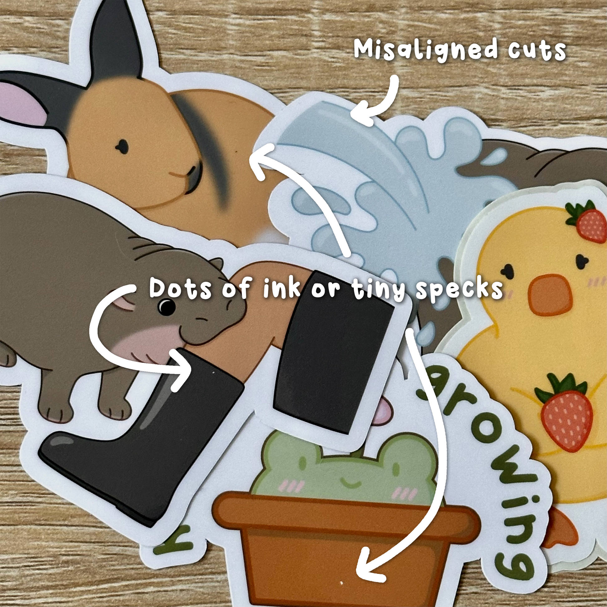 Examples of various imperfections that may be present in the stickers. Including misaligned cuts, dots of ink, and tiny specks of dust under the laminate